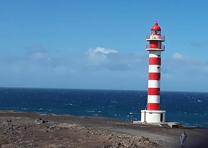 Faro De *